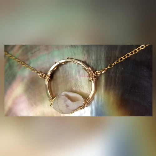 Shell wrapped circle necklace