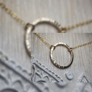 Grooved circle necklace
