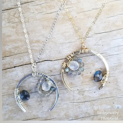 Gem wrapped crescent necklace